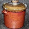 Crock for making sour kraut.  Stands 10 inches high and is 8-9 inches wide.  Holds 6 quarts.  $65.00